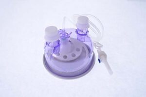 Humidification chamber made by Armstrong Medical for use in respiratory care.