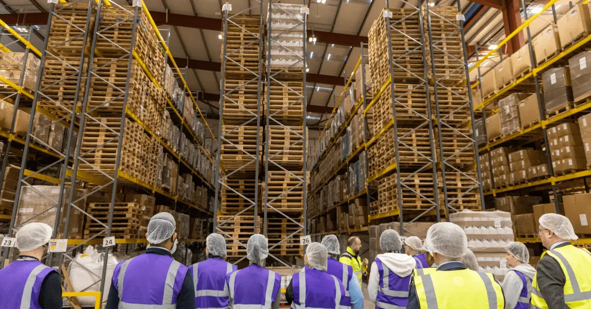 A group of nurses visiting the Armstrong Medical factory