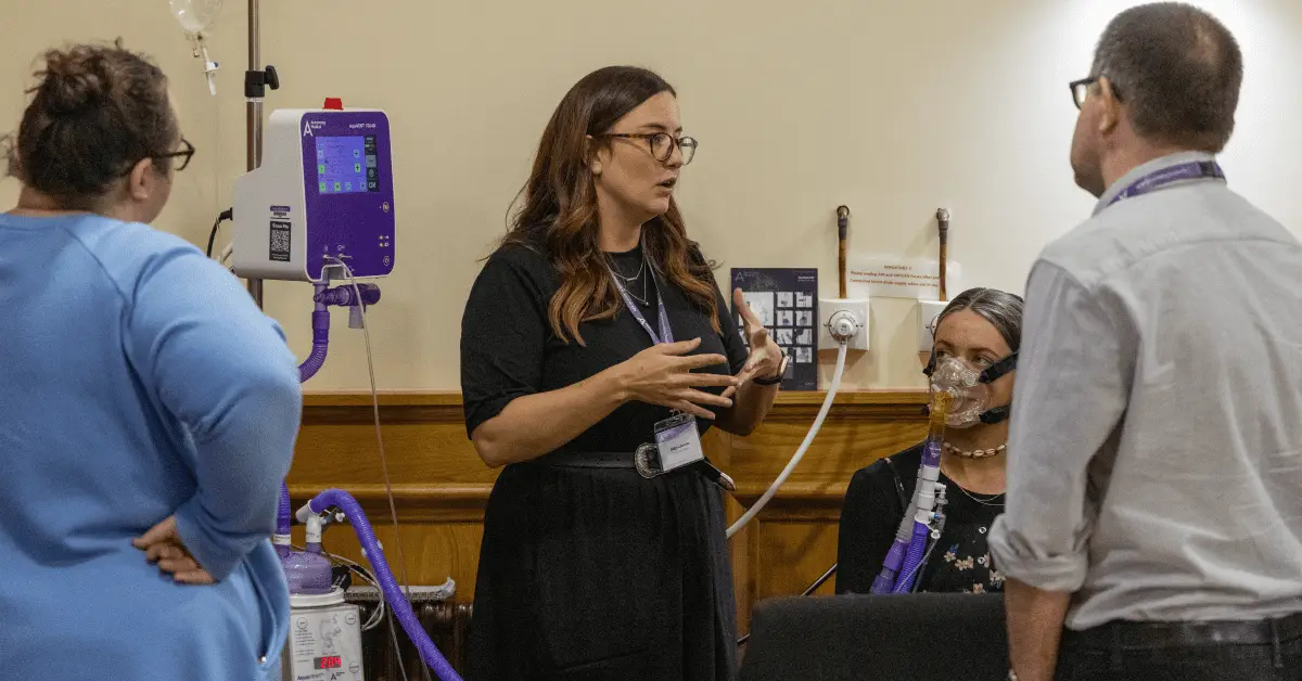 Registered nurse presenting to a group of nurses