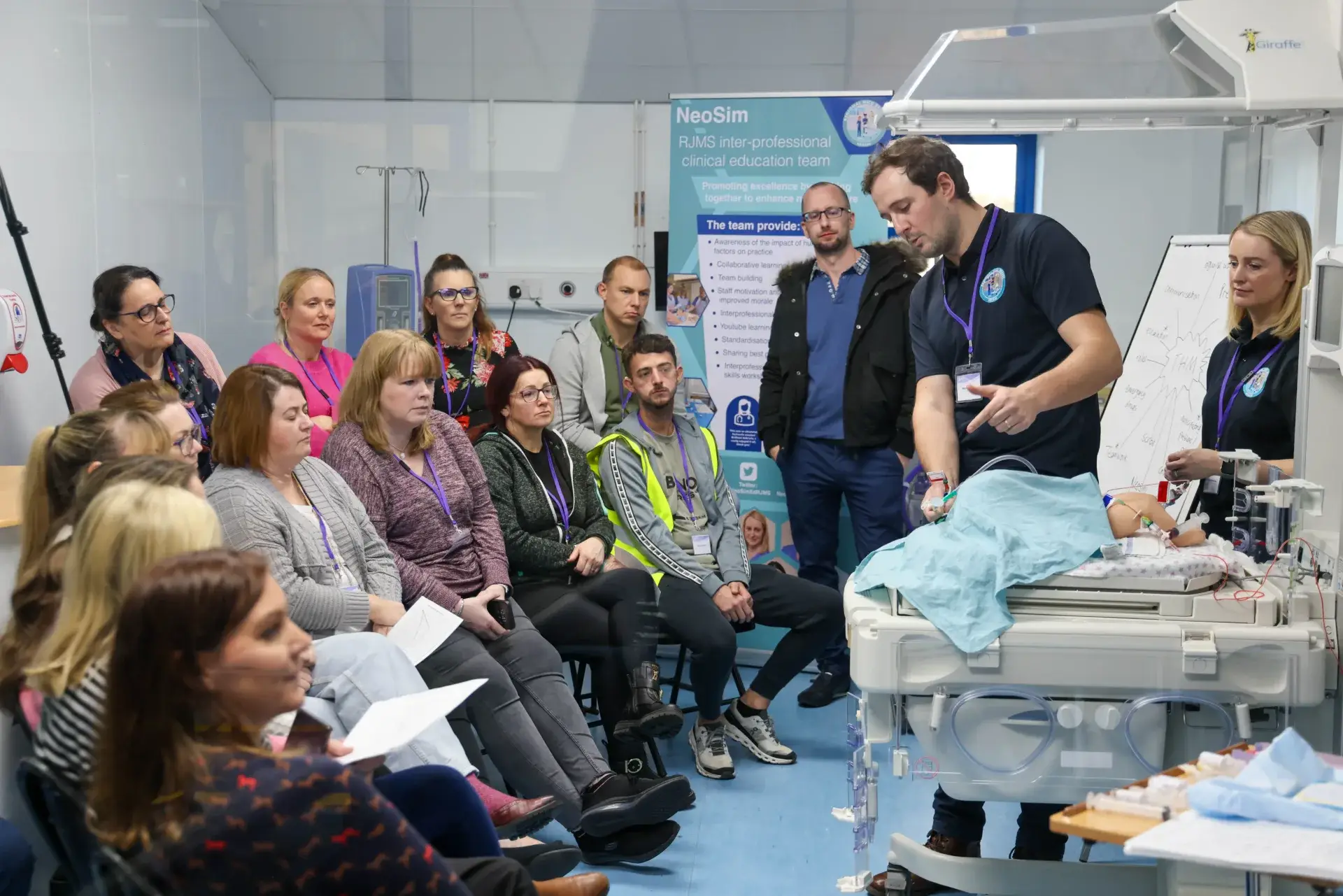 Neonatal nurse presenting to a group of nurses