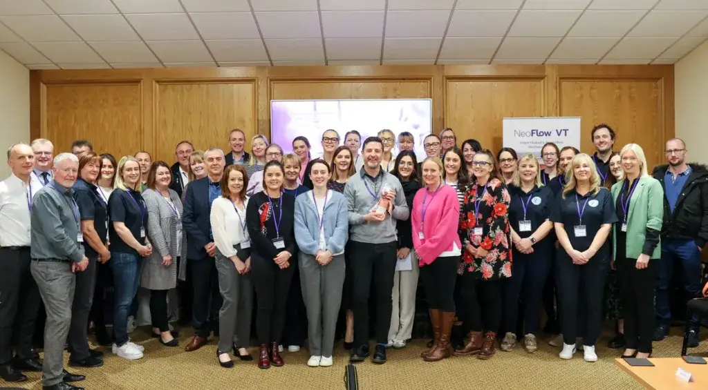 A group of neonatal nurses posing with Armstrong Medical staff